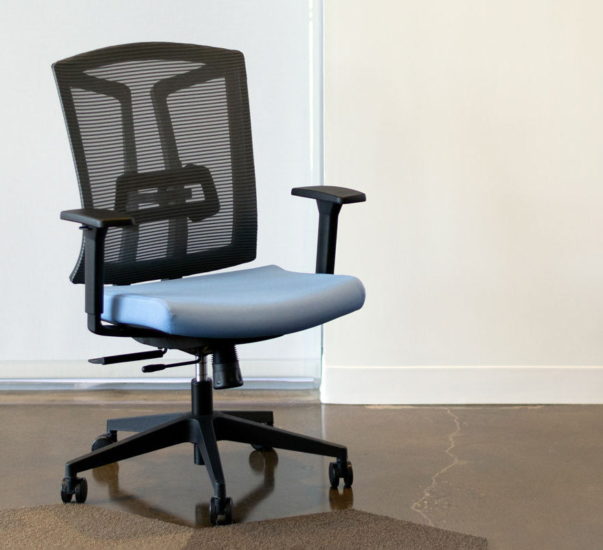 Front view of ergonomic office chair in grey mesh back and blue fabric seat.