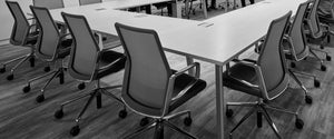 Meeting room with black conference chairs