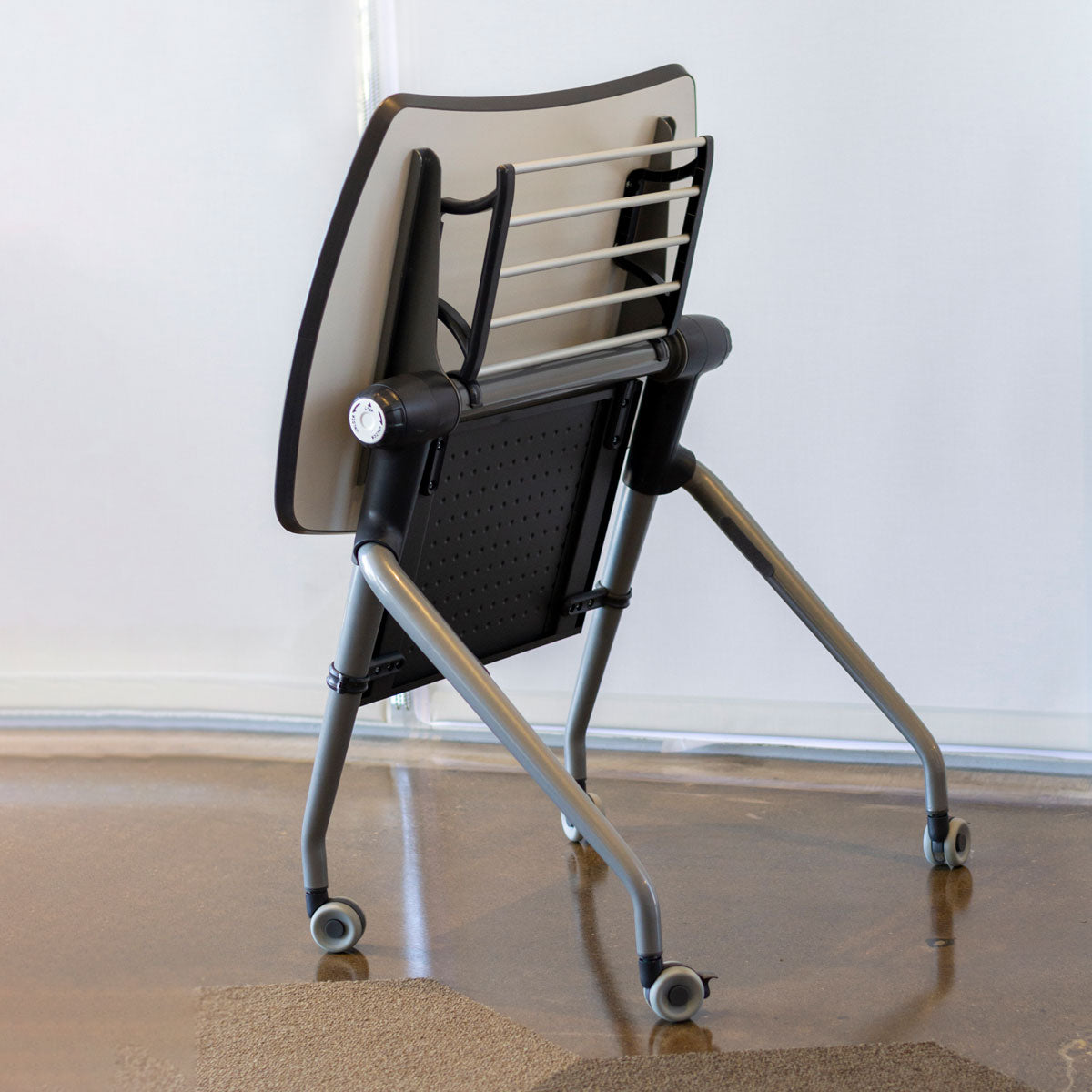 Compact flip top desk in flipped position and blue student task chair