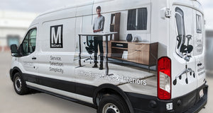 McCrum's van delivering work from home office furniture