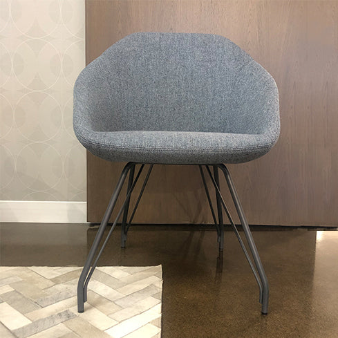 Low back grey lounge chair with four leg frame base
