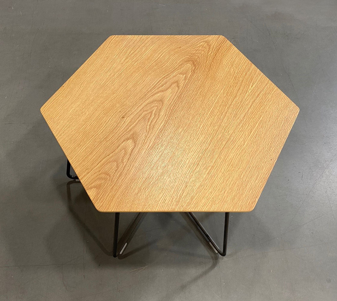 Top view of Herman Miller Pollen table with an oak top