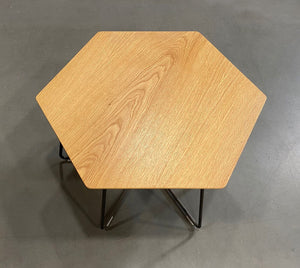 Top view of Herman Miller Pollen table with an oak top