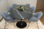Load image into Gallery viewer, Custom-made Caeserstone oval table surrounded by six  grey Allermuir Famiglia chairs
