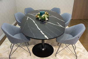 Custom-made Caeserstone oval table surrounded by six  grey Allermuir Famiglia chairs