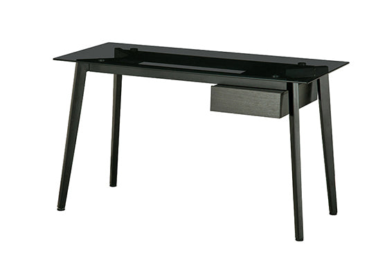 Smoke glass top desk with metal legs and small black side drawer.